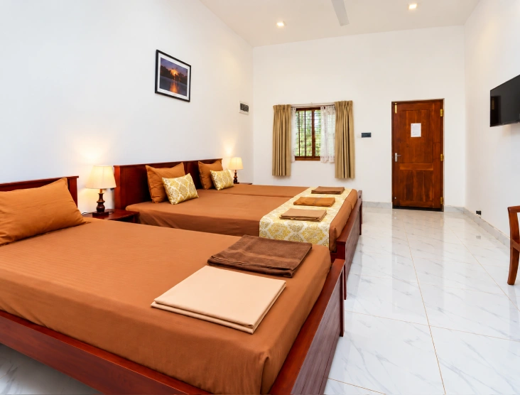 Cinnamon Deluxe Triple room